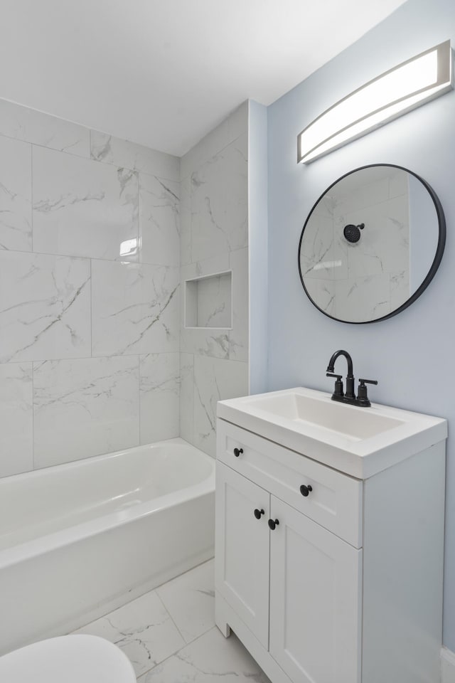 3018 14th Ave, Chattanooga, TN 37407 - full bath featuring marble finish flooring, vanity, and bathtub / shower combination