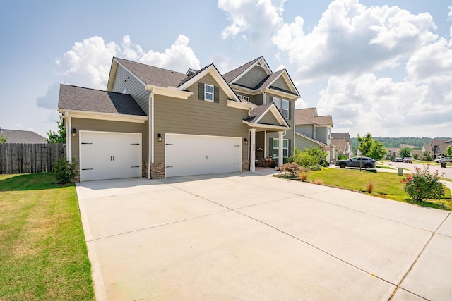 3328 Prairie Range Ln, Apison, TN 37302 - view of front of property featuring concrete driveway, stone siding, an attached garage, a garage, and a shingled roof