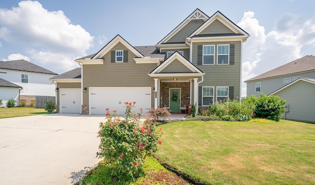 3328 Prairie Range Ln, Apison, TN 37302 - craftsman-style house with a front yard, driveway, an attached garage, and stone siding