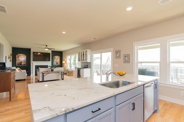 3328 Prairie Range Ln, Apison, TN 37302 - kitchen featuring a ceiling fan, dishwasher, an island with sink, wine cooler, and light wood finished floors