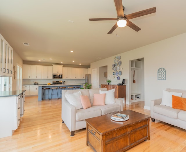 3328 Prairie Range Ln, Apison, TN 37302 - living area with light wood-type flooring, a ceiling fan, and recessed lighting