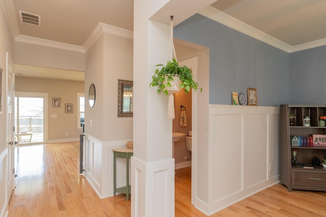 3328 Prairie Range Ln, Apison, TN 37302 - corridor featuring light wood-style flooring, crown molding, wainscoting, and a decorative wall