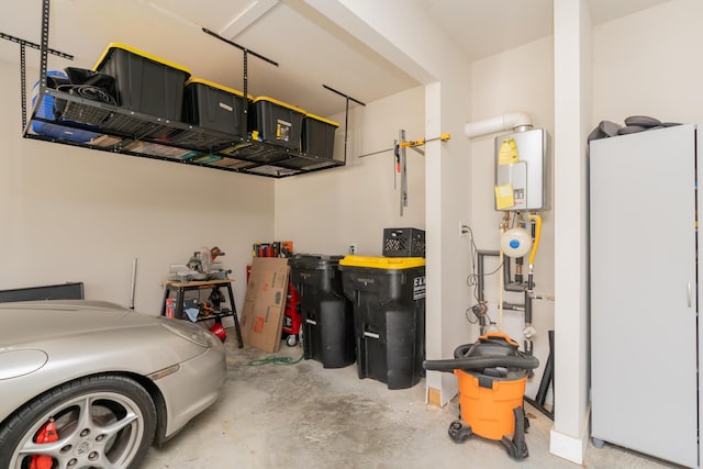 3328 Prairie Range Ln, Apison, TN 37302 - garage featuring white fridge and tankless water heater