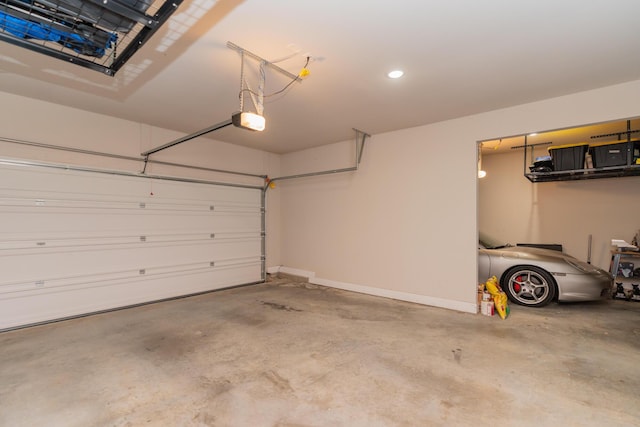 3328 Prairie Range Ln, Apison, TN 37302 - garage featuring a garage door opener and recessed lighting