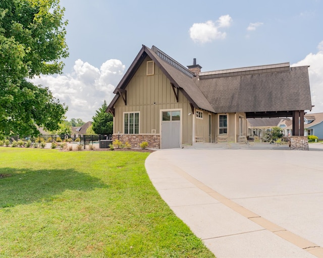 3328 Prairie Range Ln, Apison, TN 37302 - craftsman-style home featuring board and batten siding, roof with shingles, concrete driveway, and stone siding