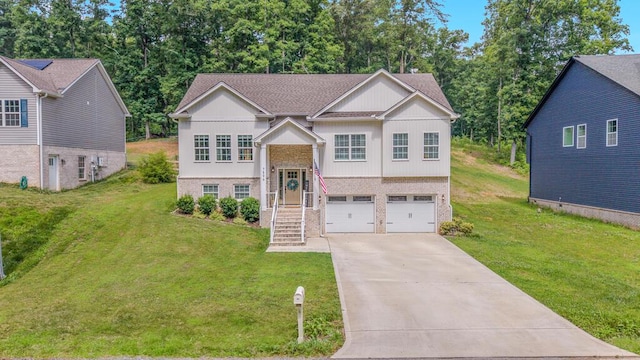 7596 Grasshopper Rd, Georgetown, TN 37336 - raised ranch with driveway, board and batten siding, an attached garage, brick siding, and a front lawn