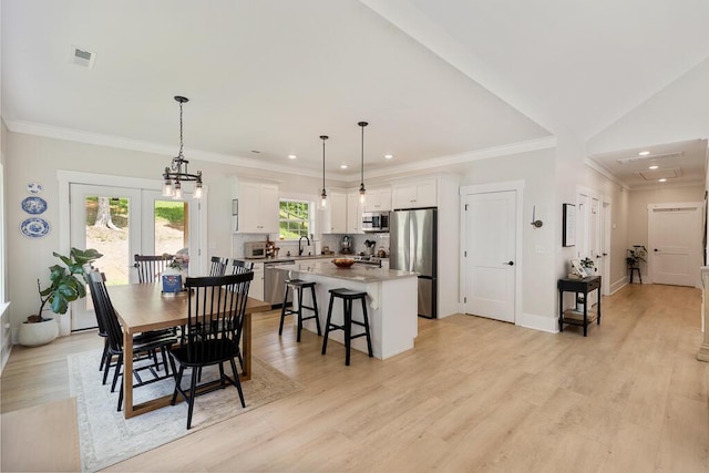 7596 Grasshopper Rd, Georgetown, TN 37336 - dining space with recessed lighting, light wood-type flooring, and crown molding