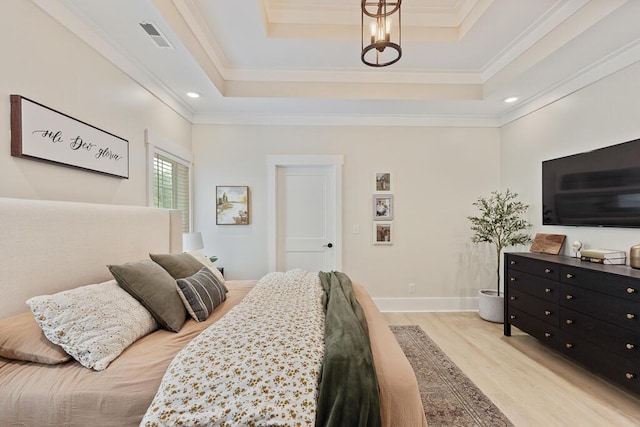 7596 Grasshopper Rd, Georgetown, TN 37336 - bedroom featuring a raised ceiling, light wood finished floors, crown molding, a chandelier, and recessed lighting