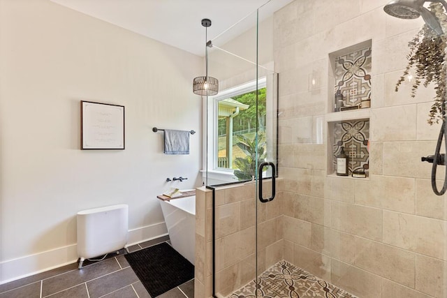 7596 Grasshopper Rd, Georgetown, TN 37336 - full bathroom featuring a shower stall, a freestanding bath, and tile patterned floors