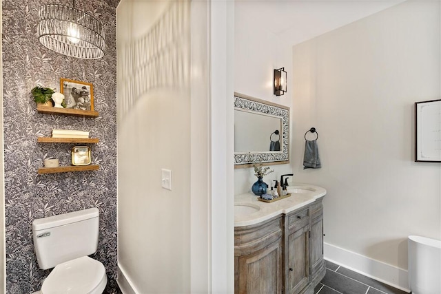 7596 Grasshopper Rd, Georgetown, TN 37336 - bathroom featuring tile patterned floors, double vanity, and wallpapered walls