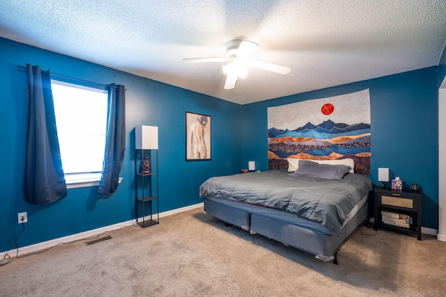 6220 Hunter Valley Rd, Ooltewah, TN 37363 - carpeted bedroom with a textured ceiling and ceiling fan