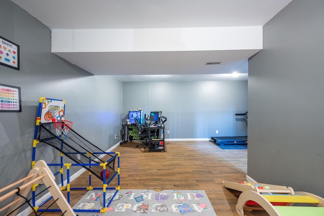 6220 Hunter Valley Rd, Ooltewah, TN 37363 - rec room with wood finished floors and baseboards