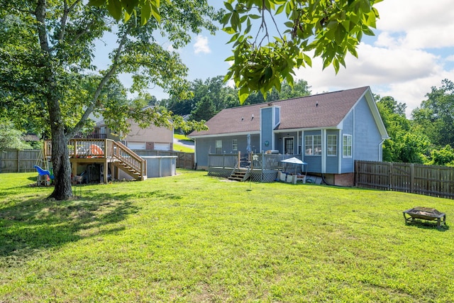 6220 Hunter Valley Rd, Ooltewah, TN 37363 - rear view of property featuring a deck, a fenced backyard, and stairway