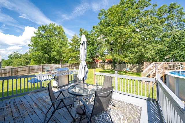 6220 Hunter Valley Rd, Ooltewah, TN 37363 - deck featuring a fenced backyard, outdoor dining area, and area for grilling