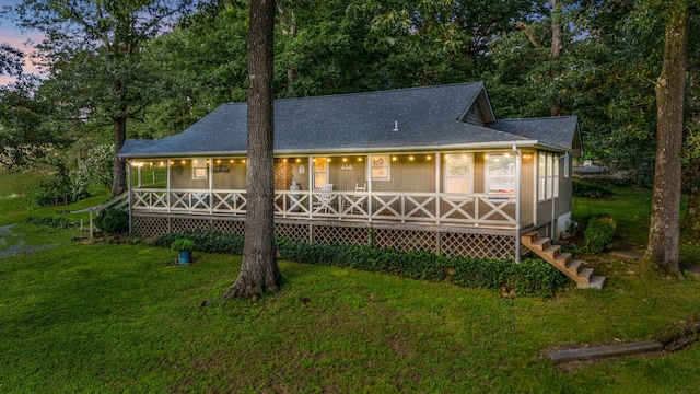 684 Mcconnell Xing, Lafayette, GA 30728 - view of front facade featuring a front lawn, a porch, a shingled roof, and stairway