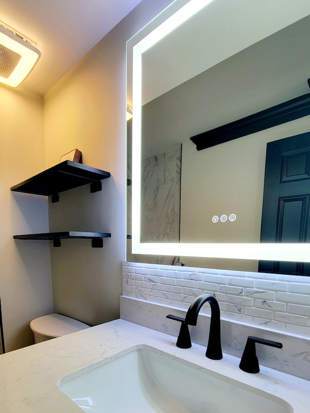 1131 Stringers Ridge Rd Unit 12H, Chattanooga, TN 37405 - bathroom with decorative backsplash and vanity