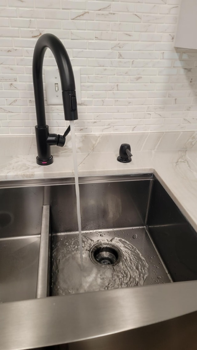 1131 Stringers Ridge Rd Unit 12H, Chattanooga, TN 37405 - kitchen view of a sink and tasteful backsplash