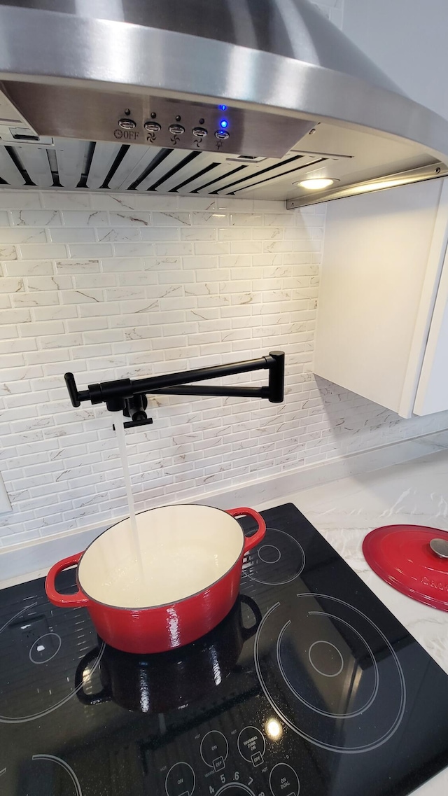 1131 Stringers Ridge Rd Unit 12H, Chattanooga, TN 37405 - kitchen view of ventilation hood, light countertops, and brick wall