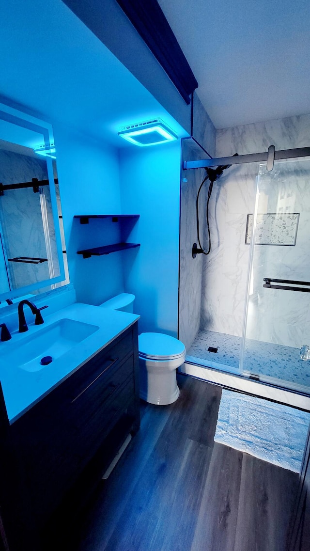 1131 Stringers Ridge Rd Unit 12H, Chattanooga, TN 37405 - full bathroom featuring vanity, a marble finish shower, and wood finished floors