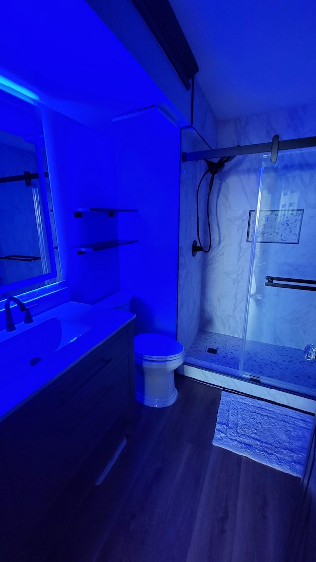 1131 Stringers Ridge Rd Unit 12H, Chattanooga, TN 37405 - full bath featuring vanity, a marble finish shower, and wood finished floors
