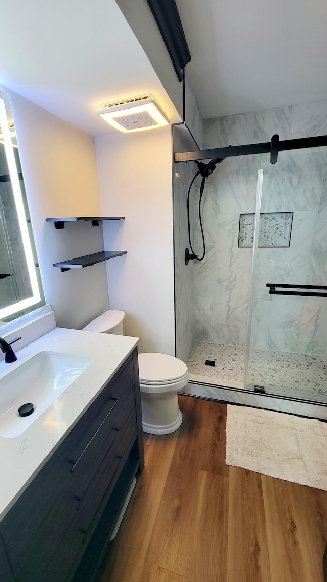 1131 Stringers Ridge Rd Unit 12H, Chattanooga, TN 37405 - full bath with vanity, wood finished floors, and a marble finish shower