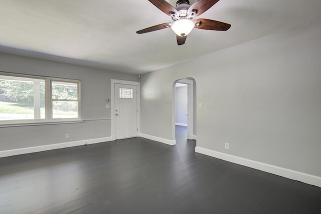 1728 John Ross Rd, Chattanooga, TN 37412 - unfurnished room featuring arched walkways, ceiling fan, and dark wood-style floors