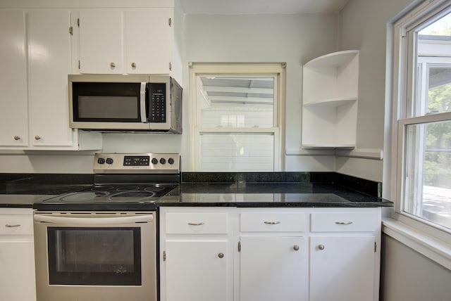 1728 John Ross Rd, Chattanooga, TN 37412 - kitchen featuring stainless steel appliances, open shelves, white cabinetry, and dark stone counters