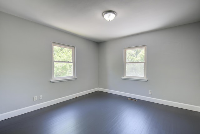 1728 John Ross Rd, Chattanooga, TN 37412 - empty room featuring baseboards and dark wood-style flooring