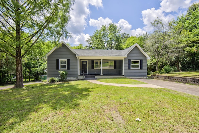 1728 John Ross Rd, Chattanooga, TN 37412 - ranch-style home featuring a porch, a front yard, a shingled roof, and concrete driveway