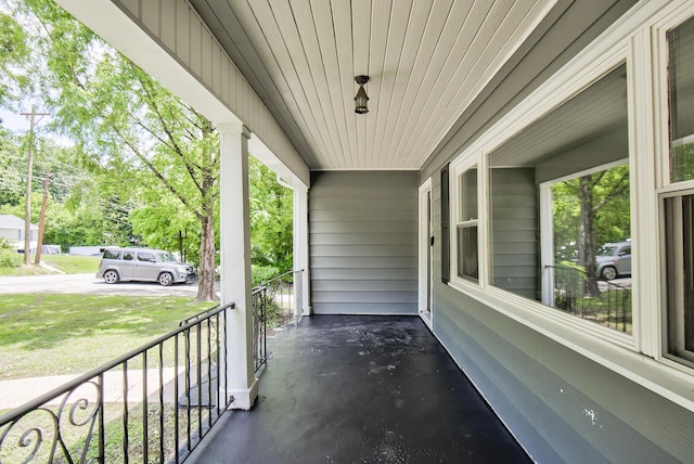 1728 John Ross Rd, Chattanooga, TN 37412 - covered porch with an attached carport and view of scattered trees