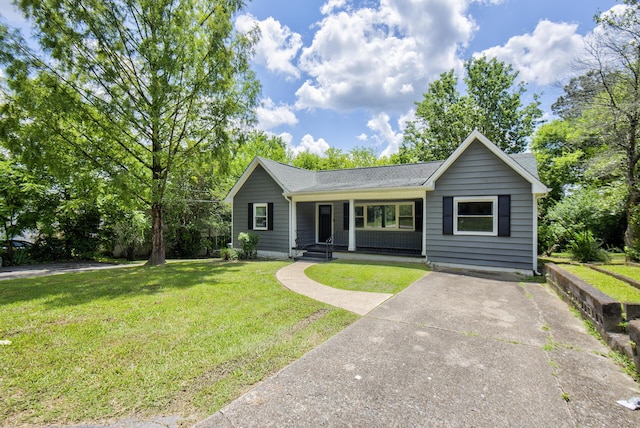 1728 John Ross Rd, Chattanooga, TN 37412 - single story home featuring covered porch, a front lawn, and a shingled roof