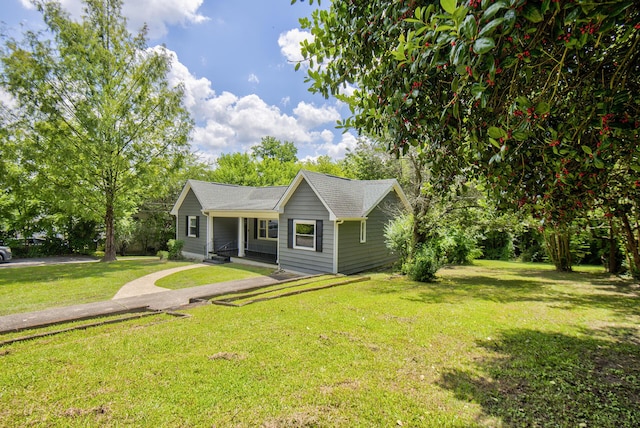 1728 John Ross Rd, Chattanooga, TN 37412 - view of front facade featuring a front lawn, covered porch, and a shingled roof