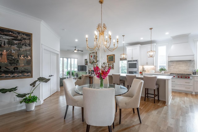 3117 Greenwich Ave, Chattanooga, TN 37415 - dining room with a chandelier, light wood finished floors, ornamental molding, recessed lighting, and ceiling fan
