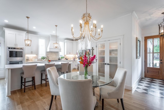 3117 Greenwich Ave, Chattanooga, TN 37415 - dining room featuring a chandelier, french doors, recessed lighting, crown molding, and light wood finished floors