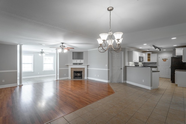 802 Applebrook Dr Unit 802, Rossville, GA 30741 - unfurnished living room featuring a ceiling fan, light tile patterned floors, a chandelier, a tile fireplace, and recessed lighting
