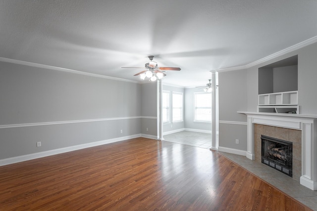 802 Applebrook Dr Unit 802, Rossville, GA 30741 - unfurnished living room with a ceiling fan, a fireplace, ornamental molding, and wood finished floors
