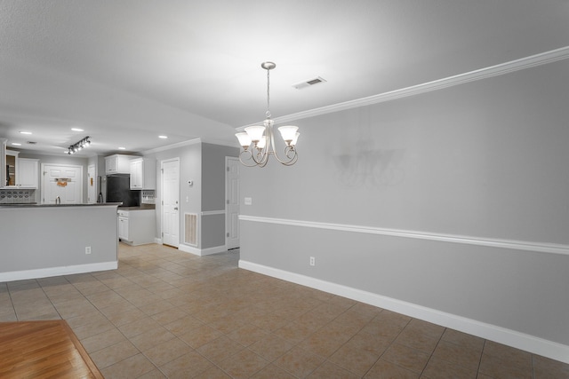 802 Applebrook Dr Unit 802, Rossville, GA 30741 - kitchen featuring crown molding, a chandelier, recessed lighting, freestanding refrigerator, and white cabinetry