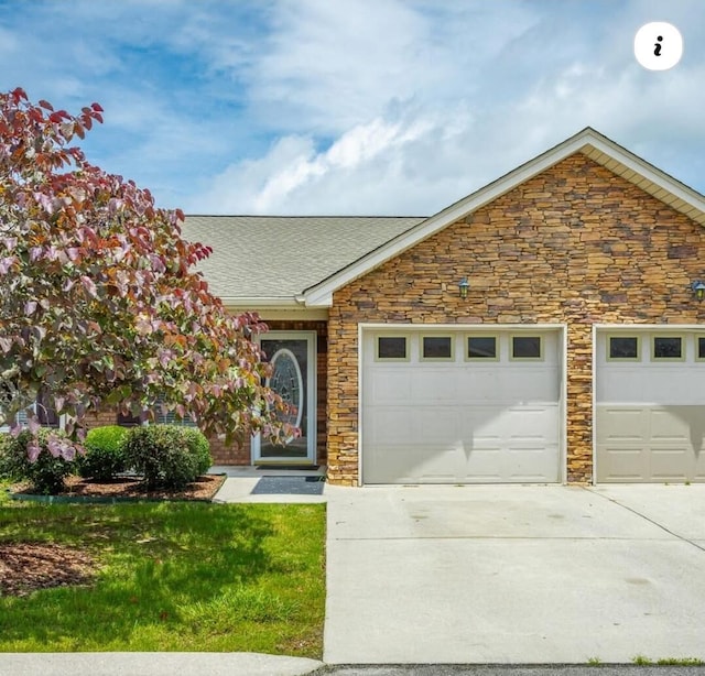 802 Applebrook Dr Unit 802, Rossville, GA 30741 - view of front facade featuring concrete driveway, an attached garage, stone siding, and a shingled roof