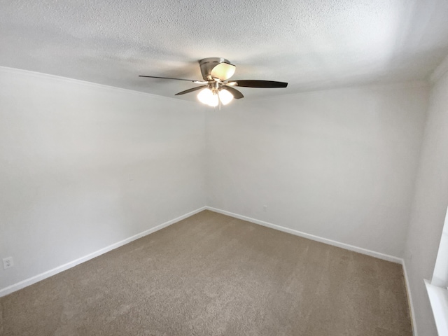 7110 Ridgestone Dr, Ooltewah, TN 37363 - carpeted empty room featuring ceiling fan, a textured ceiling, and ornamental molding