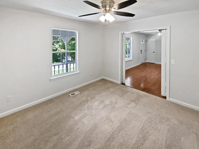7110 Ridgestone Dr, Ooltewah, TN 37363 - carpeted empty room featuring ceiling fan and baseboards