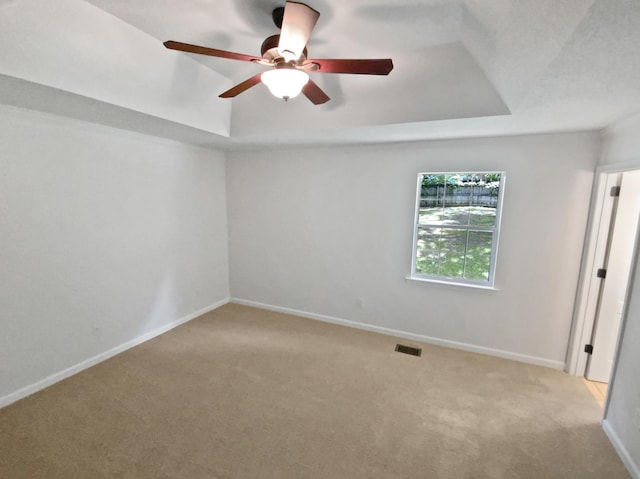 7110 Ridgestone Dr, Ooltewah, TN 37363 - carpeted empty room with a raised ceiling and ceiling fan