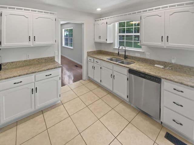 7110 Ridgestone Dr, Ooltewah, TN 37363 - kitchen featuring dishwasher, white cabinetry, light tile patterned flooring, recessed lighting, and light stone counters
