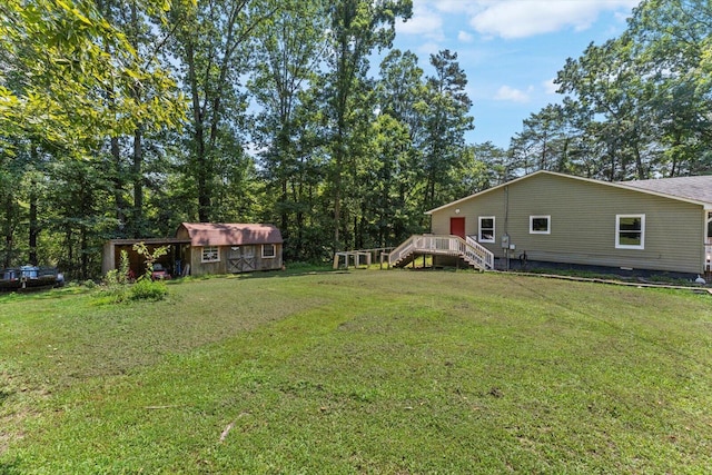 100 Anderson Ridge Rd, Jasper, TN 37347 - view of grassy yard with a storage shed and stairs