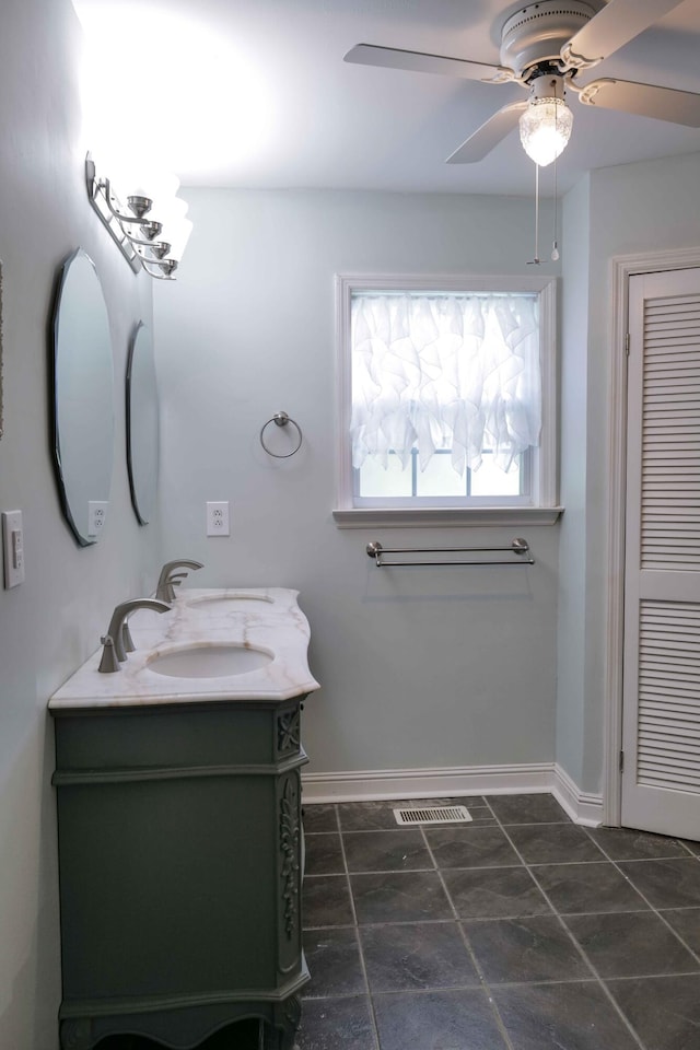 732 Salem Rd, Rossville, GA 30741 - bathroom with double vanity, a ceiling fan, and a closet