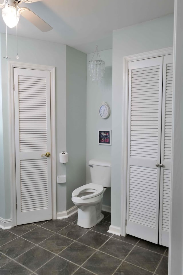 732 Salem Rd, Rossville, GA 30741 - bathroom featuring a closet, tile patterned floors, ceiling fan, and a chandelier