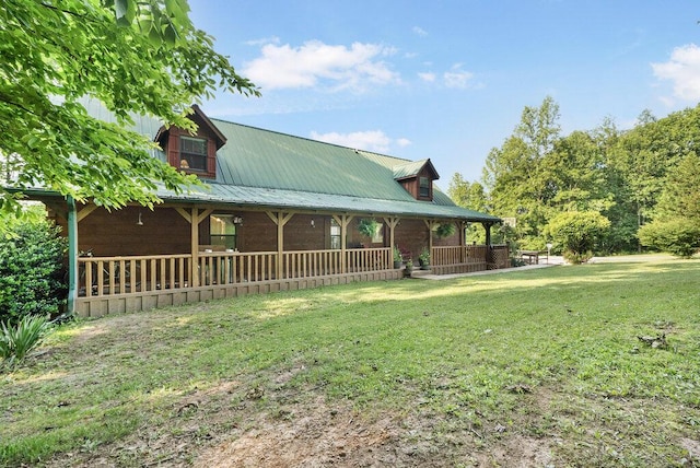 2875 Stagecoach Rd, Sewanee, TN 37375 - view of front of property featuring a front yard, a metal roof, and covered porch