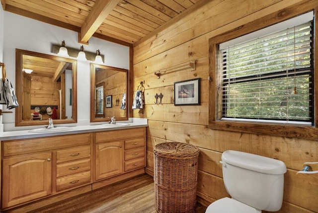 2875 Stagecoach Rd, Sewanee, TN 37375 - bathroom featuring a wooden ceiling with exposed beams, wood walls, double vanity, and wood finished floors
