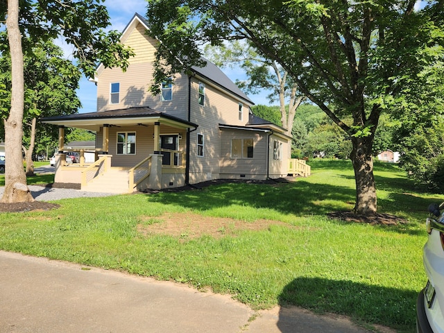 1 Magnolia St, Niota, TN 37826 - view of home's exterior with covered porch and a yard