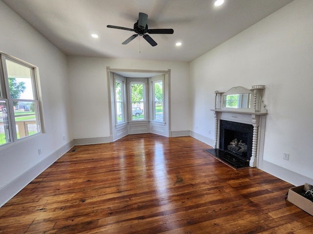 1 Magnolia St, Niota, TN 37826 - unfurnished living room with a fireplace with flush hearth, hardwood / wood-style flooring, ceiling fan, and recessed lighting