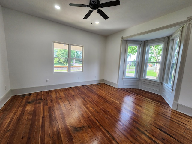 1 Magnolia St, Niota, TN 37826 - empty room featuring healthy amount of natural light, hardwood / wood-style flooring, a ceiling fan, and recessed lighting